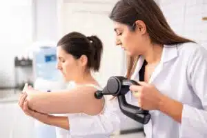 Female Doctor is examining to her patient for rotator cuff tear