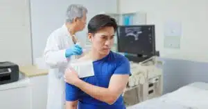 man with shoulder injury getting an ultrasound